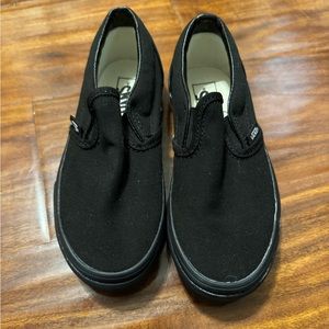 Black slip on vans size 13.5 brand new, never worn